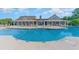 Community pool area with lounge chairs and landscaping at 646 Uniola Dr., Myrtle Beach, SC 29579