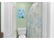 Simple bathroom with shower, toilet and patterned curtain at 650 Tupelo Ln. # 5-F, Longs, SC 29568