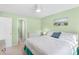 Spacious bedroom with queen bed, nightstands, and ceiling fan at 650 Tupelo Ln. # 5-F, Longs, SC 29568