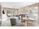 Bright living room with comfy seating and access to a balcony at 650 Tupelo Ln. # 5-F, Longs, SC 29568