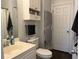 Clean bathroom with white vanity, toilet, and shower at 695 Riverwalk Dr. # 5-302, Myrtle Beach, SC 29579