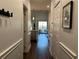 Bright hallway with view into the kitchen and living areas at 695 Riverwalk Dr. # 5-302, Myrtle Beach, SC 29579