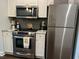 Well-equipped kitchen featuring stainless steel appliances at 695 Riverwalk Dr. # 5-302, Myrtle Beach, SC 29579