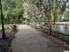 Peaceful waterfront walking path with benches and gazebo at 7055 Shady Grove Rd., Conway, SC 29527