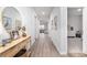 Inviting hallway leading to various rooms, featuring wood-look flooring at 822 Laconic Dr., Myrtle Beach, SC 29588