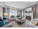 Bright and airy living room with fireplace, large windows, and comfortable seating at 8922 North Ocean Blvd., Myrtle Beach, SC 29572