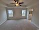 Spacious bedroom with neutral carpeting and ceiling fan at Tbb 1 Pee Dee Hwy., Conway, SC 29527