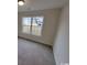 Well lit bedroom with carpet flooring and large window at Tbb 1 Pee Dee Hwy., Conway, SC 29527
