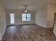 Bright and spacious living room with vinyl plank floors and lots of natural light at Tbb 1 Pee Dee Hwy., Conway, SC 29527