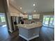 L-shaped kitchen island with granite countertops and stainless steel appliances at Tbd 2 Mineral Springs Rd., Conway, SC 29527