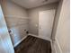 Laundry room with built-in shelving and dark flooring at Tbd 2 Mineral Springs Rd., Conway, SC 29527