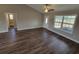 Open living room with hardwood floors, high ceilings, and views of hallway at Tbd 3 Mineral Springs Rd., Conway, SC 29527