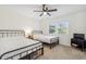 Guest bedroom with two twin beds and a TV at 100 Boundary Loop Rd. Nw, Calabash, NC 28467