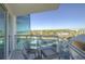 Balcony with wicker chairs, table, and a view of the surrounding area at 107 S Ocean Blvd. # 701, Myrtle Beach, SC 29577