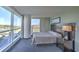 Bedroom with large windows and city views at 107 S Ocean Blvd. # 701, Myrtle Beach, SC 29577