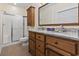 Bathroom boasts granite countertops and double sinks at 1100 Commons Blvd. # 716, Myrtle Beach, SC 29572