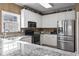 Modern kitchen with stainless steel appliances at 1100 Commons Blvd. # 716, Myrtle Beach, SC 29572