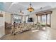 Bright living room with comfy seating, hardwood floors, and access to a balcony at 1100 Commons Blvd. # 716, Myrtle Beach, SC 29572