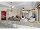 Open living space with access to balcony and bedroom at 1100 Commons Blvd. # 716, Myrtle Beach, SC 29572