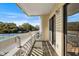 Balcony overlooking community tennis courts at 1100 Possum Trot Rd. # E235, North Myrtle Beach, SC 29582