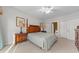 Bedroom with wooden furniture and ensuite bathroom access at 116 Cypress Point Ct. # 102, Myrtle Beach, SC 29579