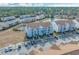 Aerial view of community with pond and building at 120 Fountain Pointe Ln. # 301, Myrtle Beach, SC 29579