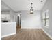 Bright dining room with hardwood floors and chandelier at 120 Fountain Pointe Ln. # 301, Myrtle Beach, SC 29579