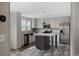 View of the kitchen with stainless steel appliances, island, and white cabinetry at 133 Melanie Brooke Ln., Conway, SC 29527