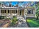 House exterior with a porch and walkway leading to the entrance at 1824 Laurel Trail # 1-B, Murrells Inlet, SC 29576