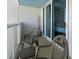 Relaxing balcony with seating and access to the bedroom at 2100 North Ocean Blvd. # 923, North Myrtle Beach, SC 29582