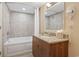 Bathroom with tiled shower, bathtub, and granite vanity at 2100 North Ocean Blvd. # 923, North Myrtle Beach, SC 29582