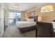 Bedroom with a king-size bed, balcony access, and nightstands at 2100 North Ocean Blvd. # 923, North Myrtle Beach, SC 29582