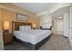Hotel-style bedroom with a king bed and dining area at 2100 North Ocean Blvd. # 923, North Myrtle Beach, SC 29582