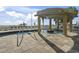 Pool area with lounge chairs and a shaded structure at 2100 North Ocean Blvd. # 923, North Myrtle Beach, SC 29582