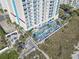 Oceanfront resort with a pool, lounge chairs, and beach access at 2100 North Ocean Blvd. # 923, North Myrtle Beach, SC 29582
