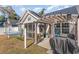 Backyard featuring a covered patio, screened porch, and hammock at 239 Coachman Dr., Pawleys Island, SC 29585