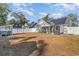 Backyard with shed, coop, hammock, and solar panels at 239 Coachman Dr., Pawleys Island, SC 29585