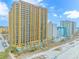 Aerial view of beachfront building, showcasing oceanfront location at 2600 North Ocean Blvd. # 211, Myrtle Beach, SC 29577