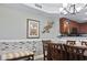 Dining area with ocean views and a bench at 2600 North Ocean Blvd. # 211, Myrtle Beach, SC 29577