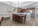 Bright dining area with hardwood floors and kitchen access at 2600 North Ocean Blvd. # 211, Myrtle Beach, SC 29577