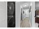 Stackable washer and dryer in closet at 2600 North Ocean Blvd. # 211, Myrtle Beach, SC 29577