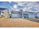 Backyard with screened porch and grassy area at 268 Empyrean Circle, Myrtle Beach, SC 29588