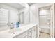 Clean and bright bathroom with white vanity, sink, and mirror at 268 Empyrean Circle, Myrtle Beach, SC 29588