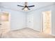 Bedroom with ceiling fan, closet, and access to ensuite bathroom at 268 Empyrean Circle, Myrtle Beach, SC 29588