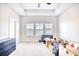 Bedroom with plush carpet, windows overlooking water, and ample space at 268 Empyrean Circle, Myrtle Beach, SC 29588