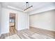 Open dining area with wood-look flooring and a modern light fixture at 268 Empyrean Circle, Myrtle Beach, SC 29588