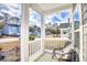Inviting front porch with seating and a view of the neighborhood at 268 Empyrean Circle, Myrtle Beach, SC 29588