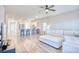 Living room with white sectional sofa, ceiling fan, and open view of the kitchen at 268 Empyrean Circle, Myrtle Beach, SC 29588