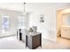Home office with a large desk, natural light, and an attached bathroom at 268 Empyrean Circle, Myrtle Beach, SC 29588