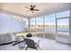 Screened porch with water view, seating, and grill at 268 Empyrean Circle, Myrtle Beach, SC 29588